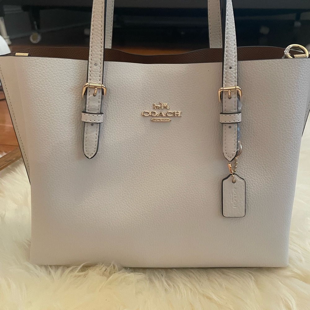 crème coach mini purse